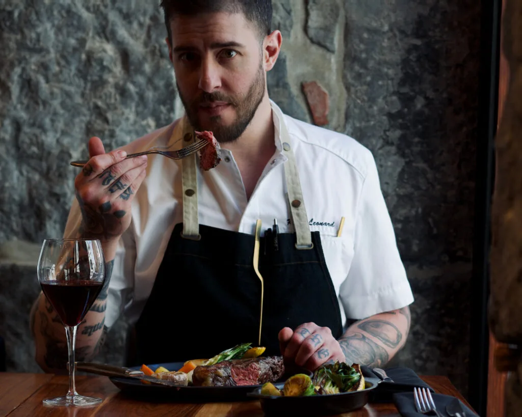 Executive chef Rob Leonard having a contre fillet with his red.