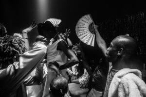 Participants at “Heavenly Bodies,” an underground drag ballroom event during Lagos Pride, celebrate the “mother of the year” winner.