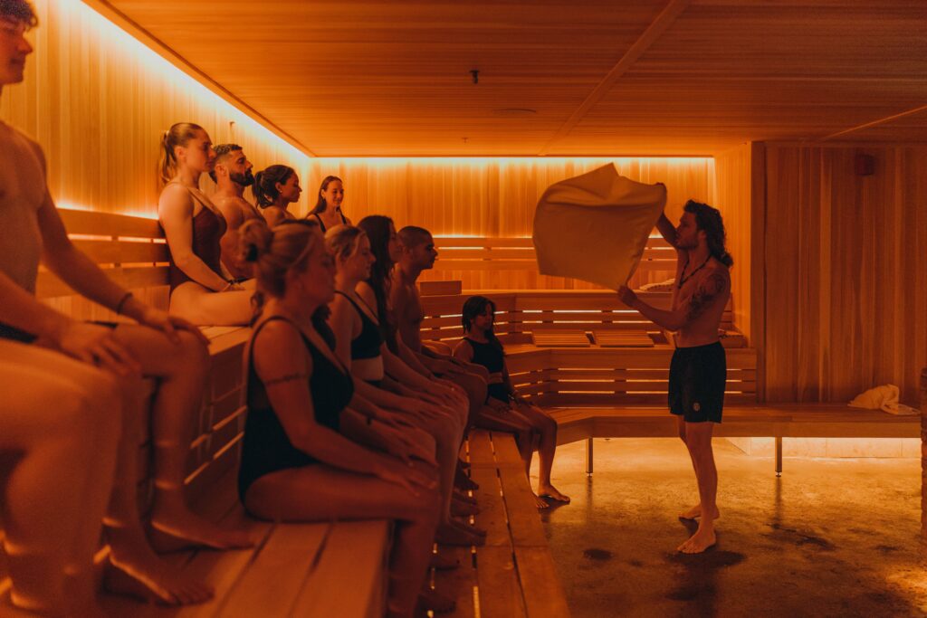 Group sauna ritual. this is the image that visually sells the social-wellness concept. Best Kept MTL