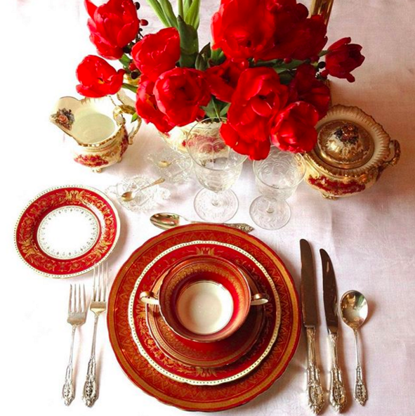 Antique red and gold porcelain, crystal and silver table setting