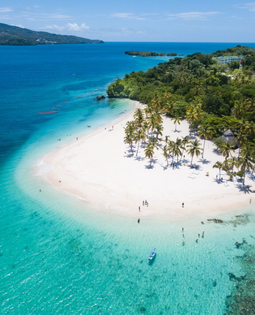 Turquoise water and a palm-lined beach at Cayo Levantado, Dominican Republic