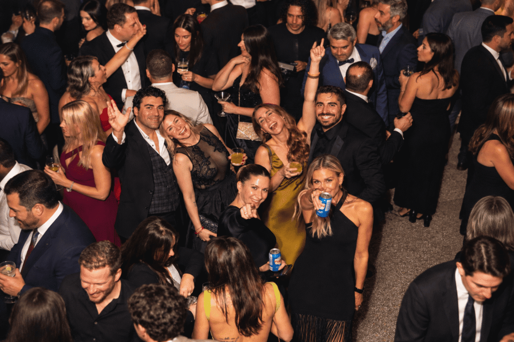 Overhead photograph of guests celebrating together.