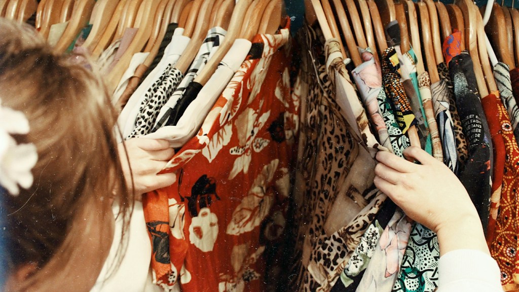 Colourful vintage clothing on a rack; illustrative photograph
